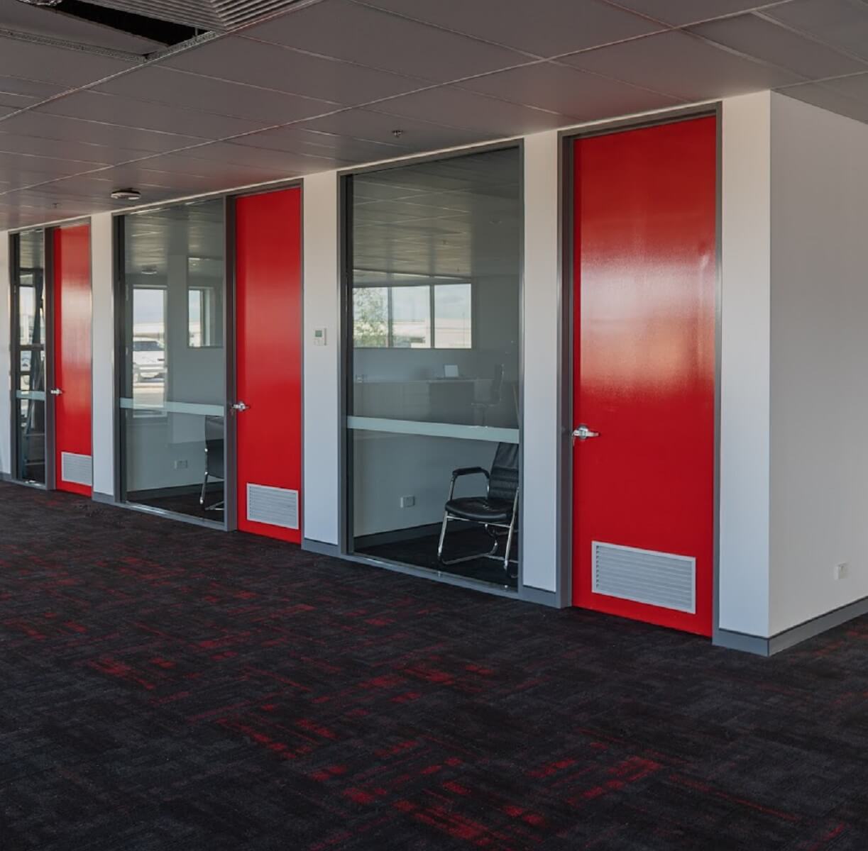 Freshly painted office in red and grey by AJ Cochrane Commercial Painters, Perth