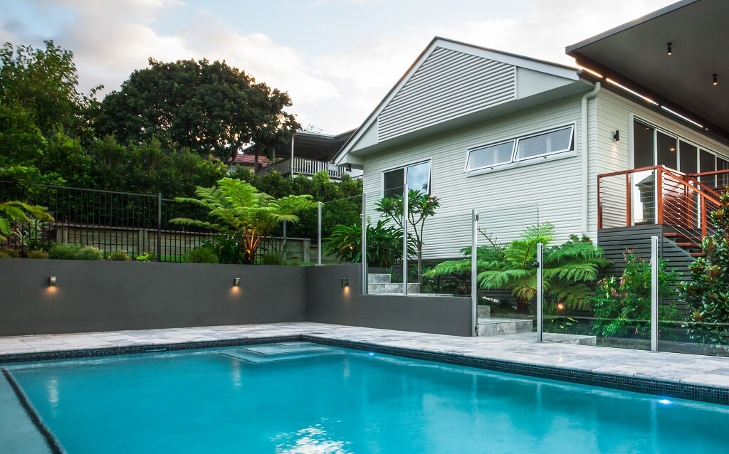 Australian home with backyard pool.  Painted surfaces poolside to make an impact.